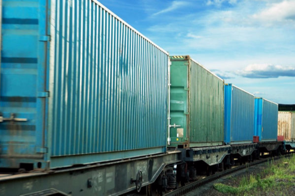 Freight train with blue containers